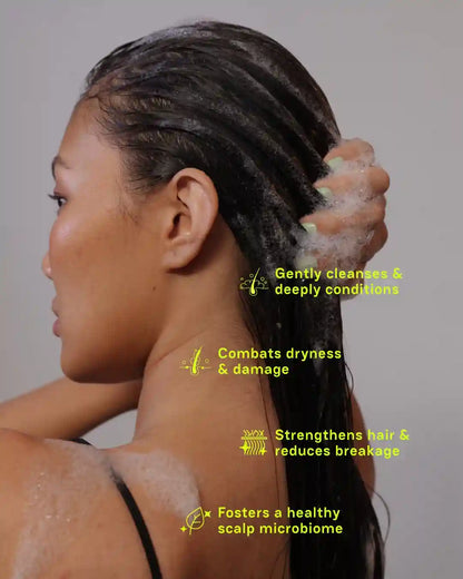 Girl applying Moxie shampoo during hair wash highlighting gentle cleansing and healthy scalp care
